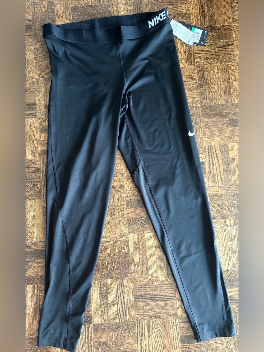Nike Black Women's Performance Leggings with White Swoosh